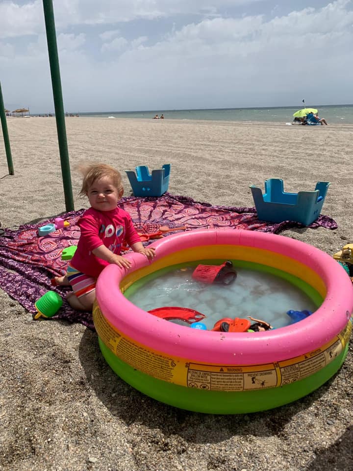 Baby on a beach throw