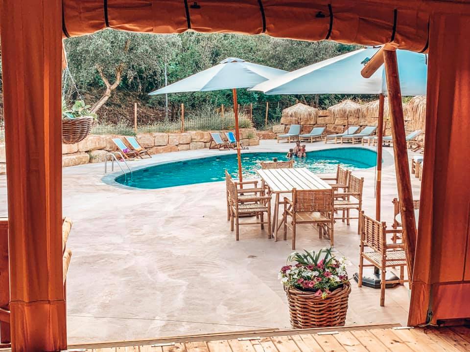 pool view from dining area at Can Bora Lodges