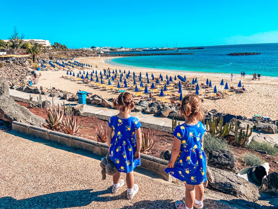 Twins looking over the beach in Yaiza