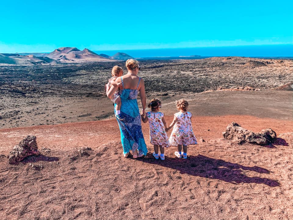 Family overlooking the Volcanic landscape in Lanzarote