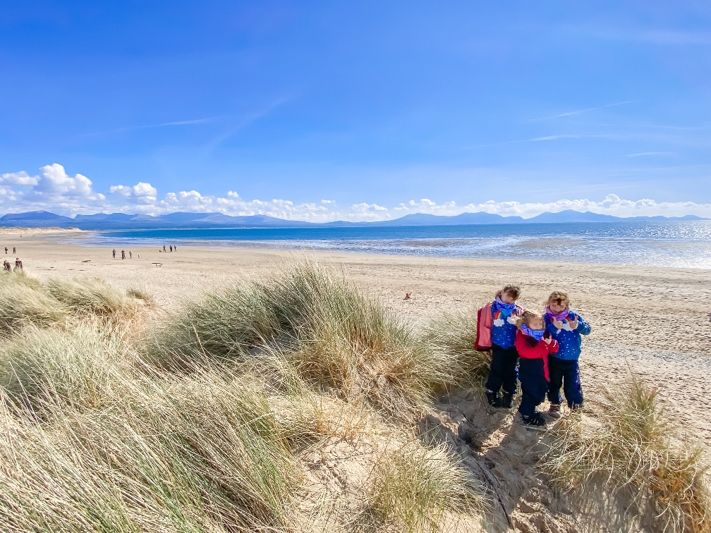 Away Resorts Golden Sands Rhyl Anglesey Newborough Warren 3 girls playing in the sand dunes