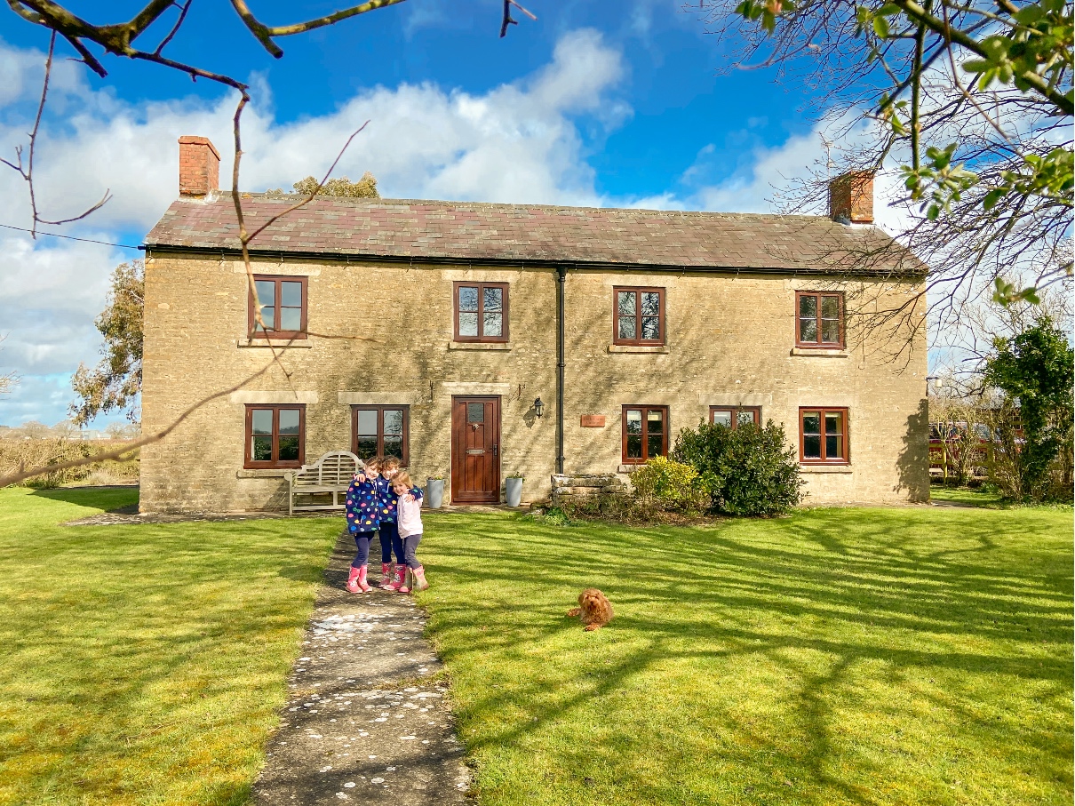 Classic Cottages Park Farm Cottage sunny day with three small girls standing out the front