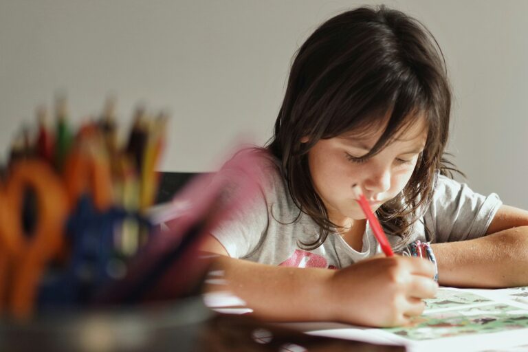a girl writing concentrating on grammar