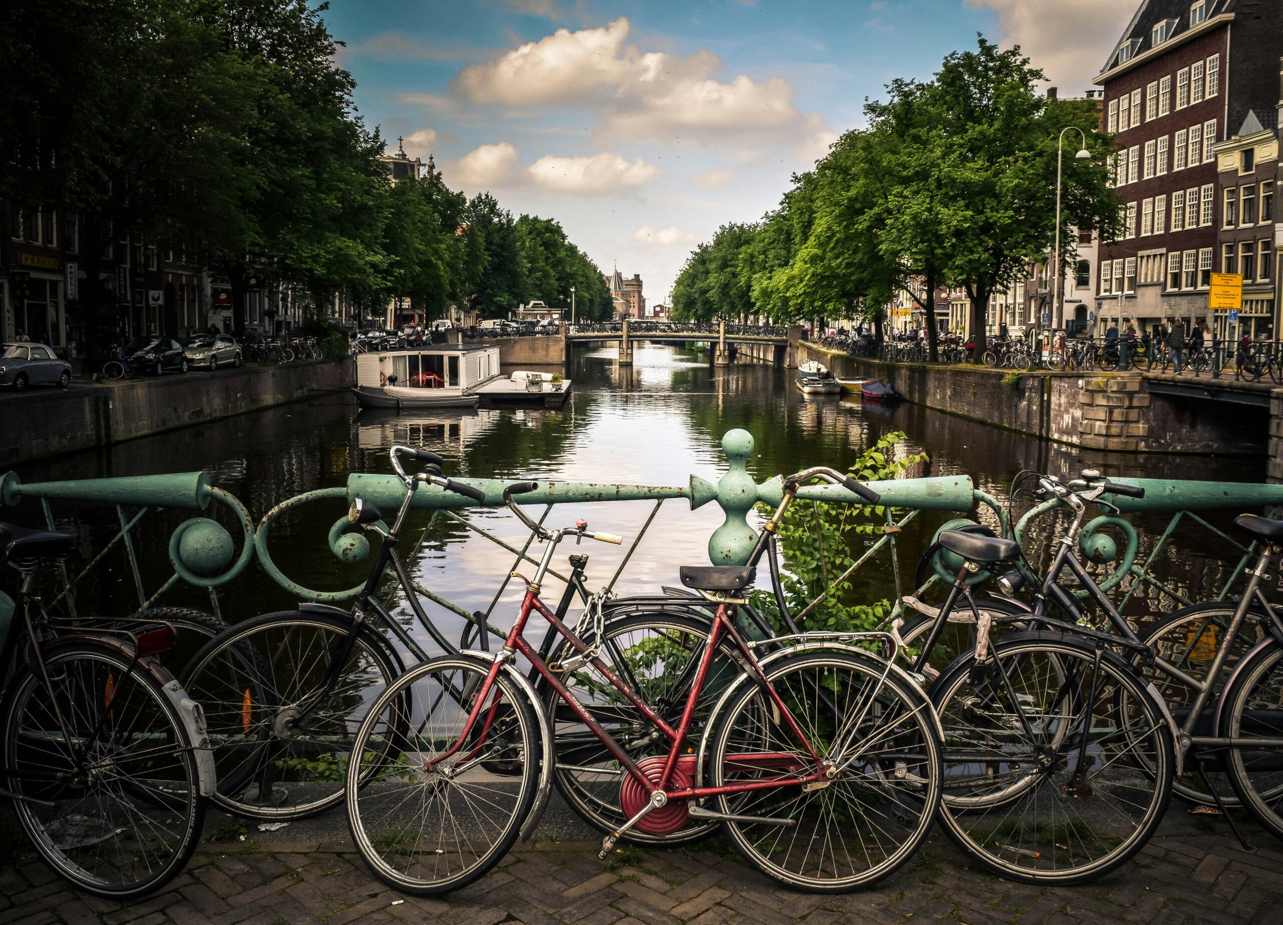 Bikes alongside the river in Amsterdam